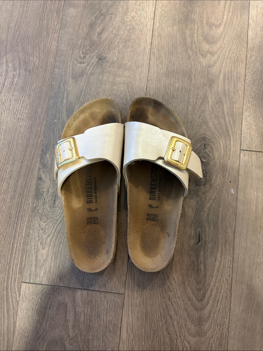 Birkenstock Single-Strap Slide Sandals in Cream with Gold Buckle